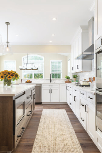 bright white kitchen cabinets with black hardware